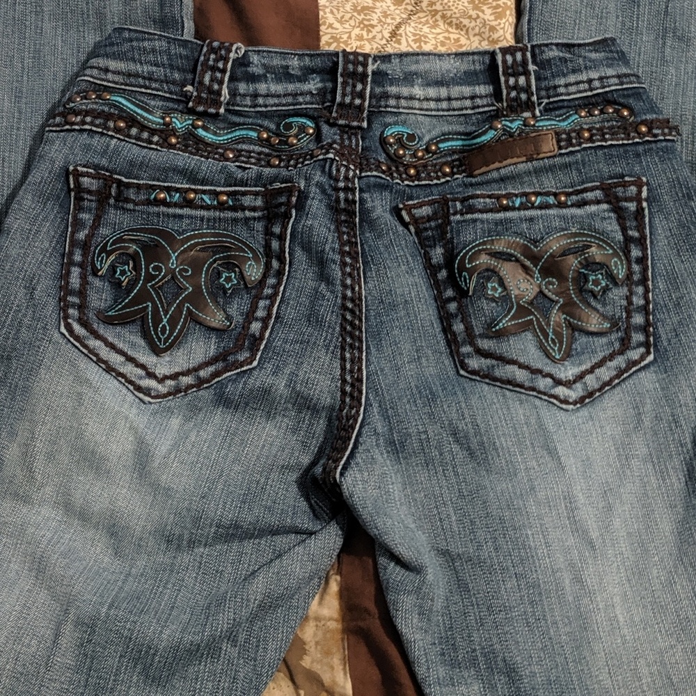 Cowgirl Tuff Boot cut jeans with gorgeous designs